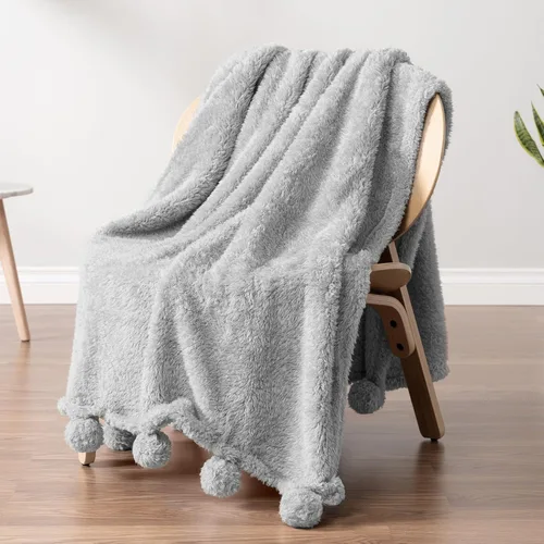 Vista 23 de PAVILIA Manta de sherpa negra para sofá, cálida manta de felpa con pompones, manta mullida para sofá, ligera, suave y acogedora con pompones, 50 x