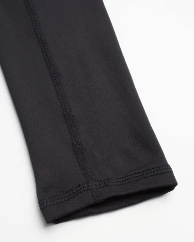 Vista 4 de Reebok Camisa térmica de rendimiento para hombre, camisa de manga larga atlética de capa base (S-XL)
