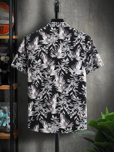 Vista 2 de Floerns Camisa hawaiana de manga corta con botones y estampado tropical para hombre