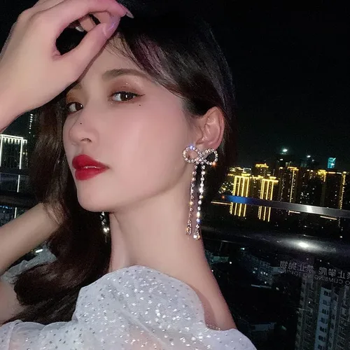 Vista 6 de Pendientes de diamantes de imitación hipoalergénicos para mujer, aretes colgantes de lazo de cristal de moda