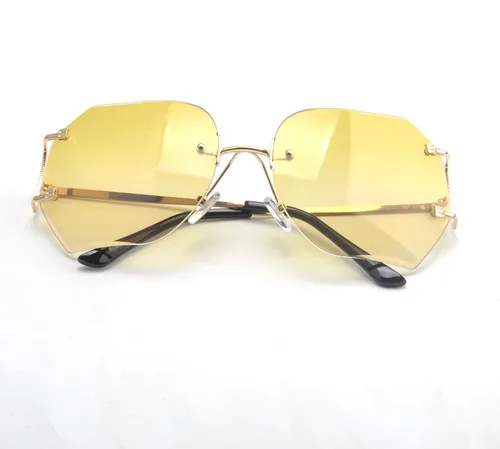 Vista 7 de lentes de sol sin montura de tamaño grande con lentes transparentes para mujer.
