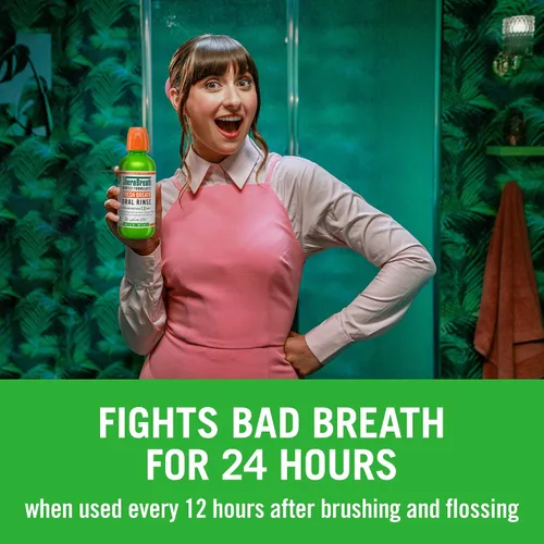 Vista 5 de TheraBreath Enjuague oral de menta helada formulado por dentistas (paquete de 6) y enjuague bucal de menta suave (paquete de 2)
