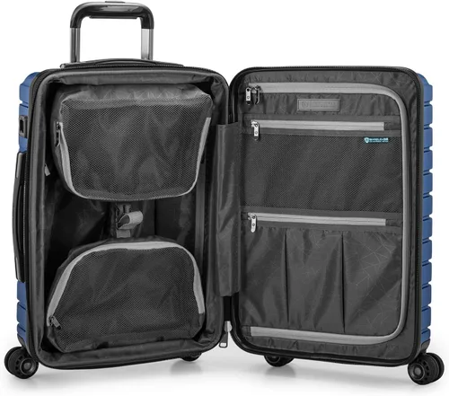 Vista 5 de Traveler's Choice Archer - Juego de equipaje giratorio de policarbonato duro, azul, 21 pulgadas, correas de amarre