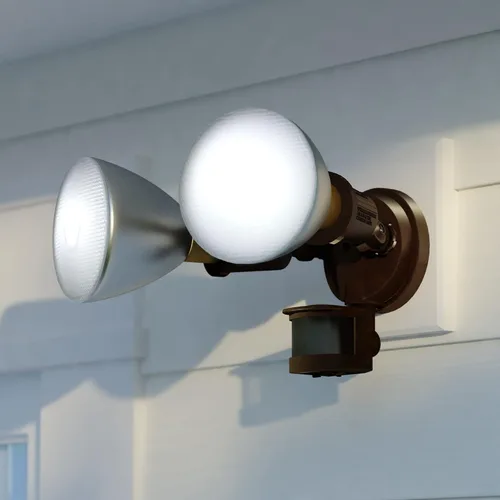Vista 2 de VAXCEL Luz de inundación de seguridad para exteriores del atardecer al amanecer con sensor de movimiento de bronce, 2 cabezales de luz ajustables, 4