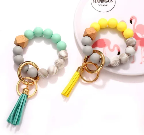 Vista 3 de 4 llaveros de silicona para mujer, pulsera elástica, llavero para casa y automóvil