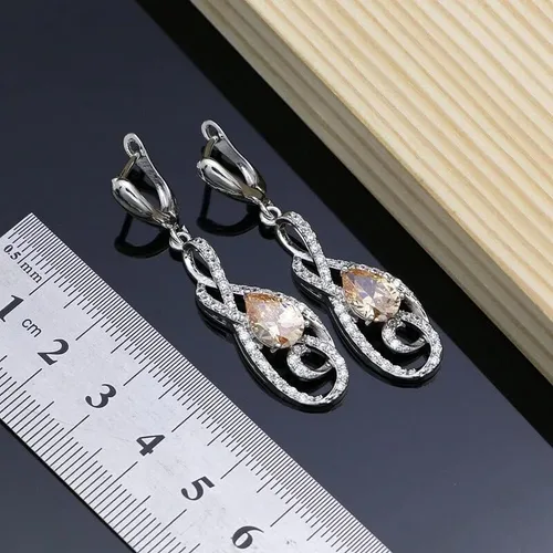 Vista 4 de Juego de joyas de boda para mujer, topacio champán, plata 925, aretes largosdijecollaranillopulsera de moda