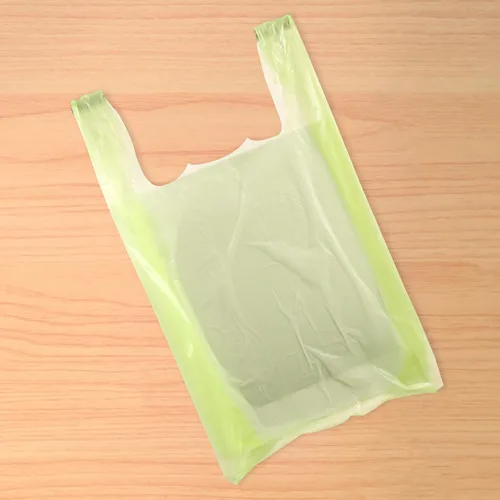 Vista 3 de SSWBasics Bolsas de plástico verde lima para camisetas - Caja de 1,000