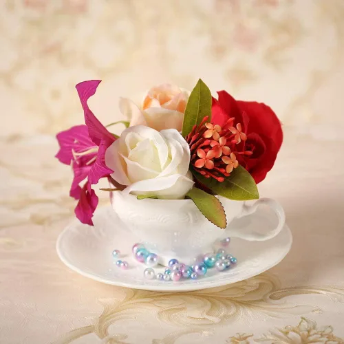 Vista 2 de Juego de taza de té y platillo de porcelana fina, superficie de escultura, taza ligera de 7 onzas, juego de cuatro