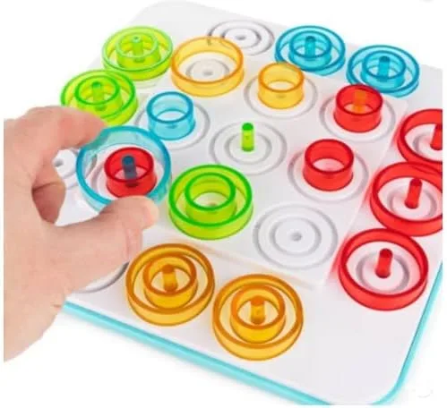Vista 2 de Otrio - Juego de mesa con piezas rojas, verdes, amarillas y azules, para 2 a 4 jugadores de 8 años a adultos. Juego de mesa basado en estrategias