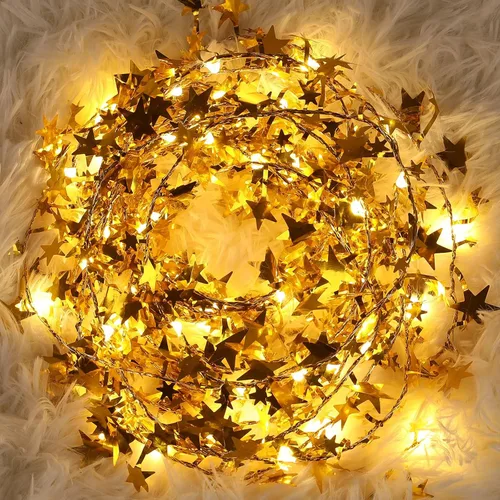 Vista 2 de Guirnalda de luces doradas con forma de estrella, funciona con pilas, 1 paquete de mini cable plateado con estrellas de PVC, luces LED