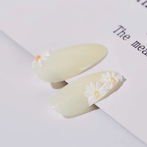 Vista 2 de RikView uñas postizas blancas en forma de almendra de longitud media, uñas adhesivas naturales, uñas en relieve con diseño de margarita