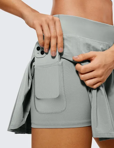 Vista 4 de CRZ YOGA Lindas faldas plisadas para mujer, de cintura alta, para tenis, golf, con bolsillos, casual, atlética, entrenamiento, patinadora