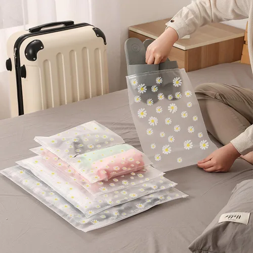 Vista 4 de 30 bolsas de almacenamiento de viaje para ropa, bolsas Ziplock de plástico transparente, 5 tamaños Daisy Pattern, Reusable Zipper Pouches
