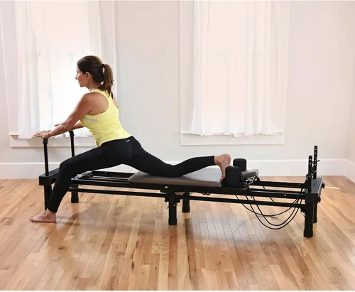 Vista 5 de Stamina Products AeroPilates Reformer 651 Máquina de entrenamiento de resistencia para todo el cuerpo para gimnasio en casa con soporte de 10