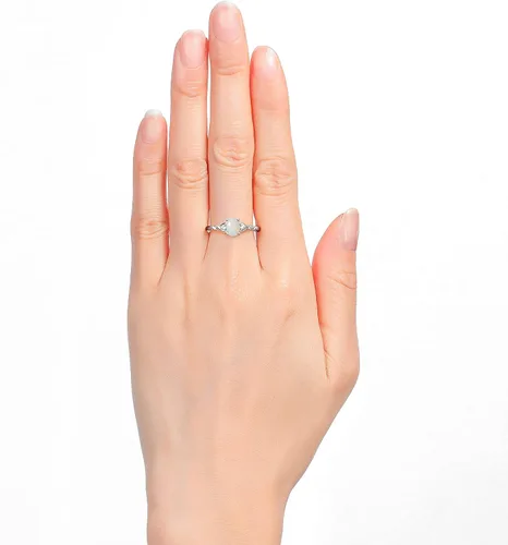 Vista 2 de Rylos Anillo clásico de plata de ley con piedra natal, piedra preciosa ovalada de 0.276 x 0.197 in y diamantes genuinos, joyería para mujer, tallas