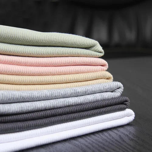 Vista 2 de GEMBERA Camiseta corta con cuello alto y espalda cruzada para mujer, sin mangas, ajustada, básica, de algodón