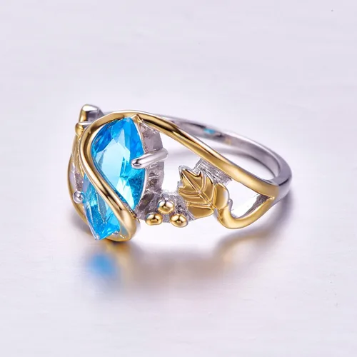 Vista 5 de Psiroy Anillo de plata de ley 925 con topacio azul y hojas