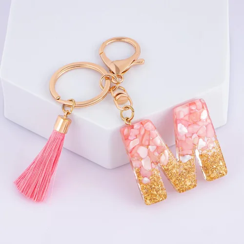 Vista 2 de Suweibuke Lindos llaveros rosados para mujeres y niñas, llaveros de letra inicial con borla, dijes para llaves, bolsos, mochilas