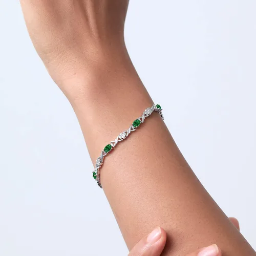 Vista 2 de Gem Stone King Pulsera de tenis de plata de ley 925 ovalada verde esmeralda simulada para mujer