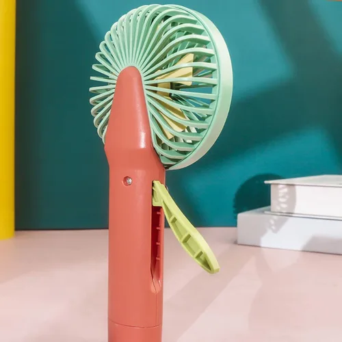 Vista 4 de Ventilador de mano no eléctrico, pequeño ventilador portátil, mini ventilador silencioso y recargable de dibujos animados de animales de oficina