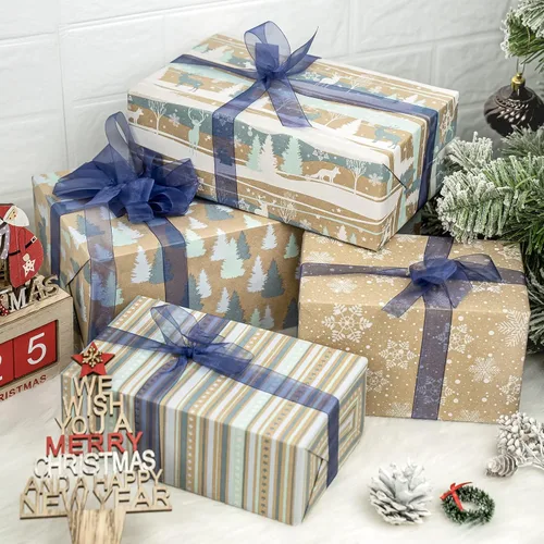 Vista 2 de RUSPEPA Papel de regalo de Navidad, papel kraft – reno, rayas y copos de nieve en diseño azul – 4 rollos – 30 pulgadas x 10 pies por rollo
