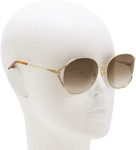 Vista 4 de Gafas de sol Gucci GG 0650 SK- 004 doradomarrón
