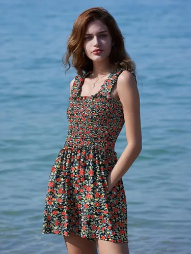 Vista 4 de DEEP SELF Mameluco de verano sin mangas para mujer, cuello cuadrado, tirantes con volantes, con bolsillos