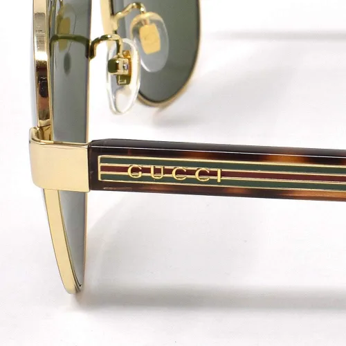 Vista 3 de Gucci GG0528S GOLDGREEN 6314150 - Lentes de sol para hombre DoradoVerde