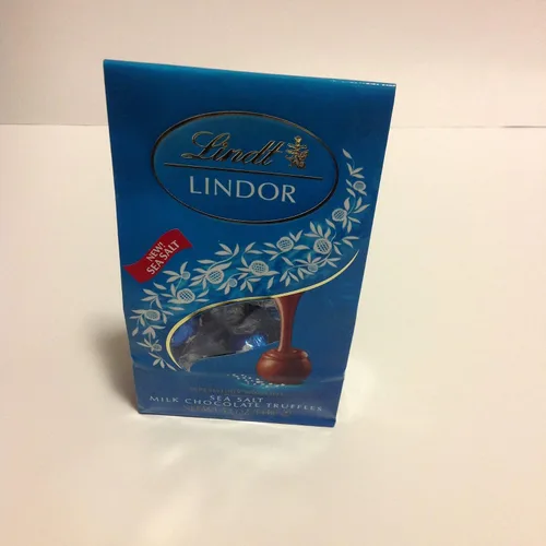 Vista 34 de Lindt Lindor - Trufas de chocolate extra oscuro 60 %, caramelo de chocolate negro con centro de trufa suave y derretida, ideal para regalar, 5.1