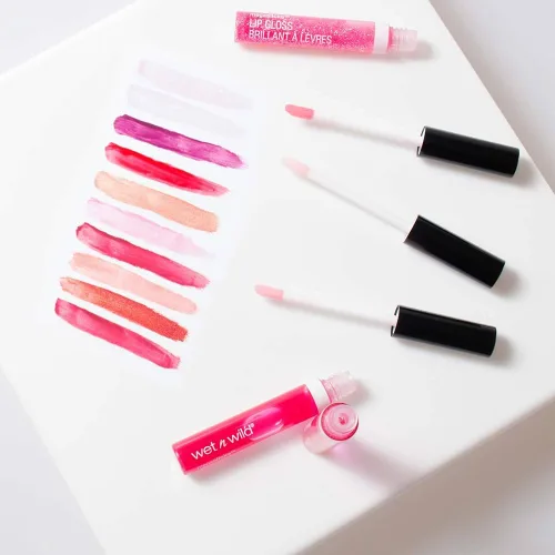 Vista 3 de Wet n Wild MegaSlicks Brillo labial, ultrabrillante, enriquecido con vitamina E, ultrabrillo de alta luminosidad hidratante, sin pruebas en animales