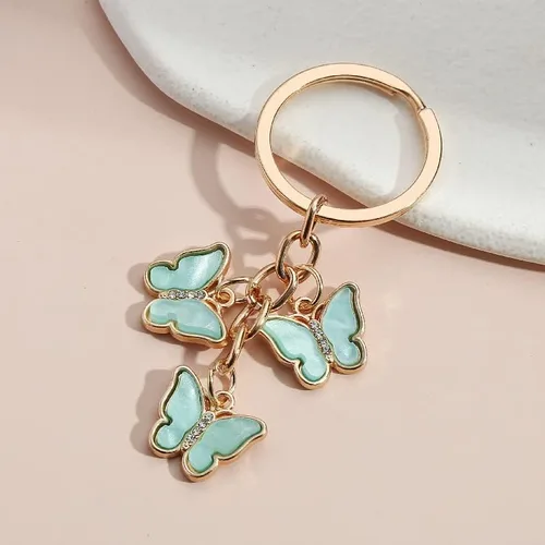 Vista 2 de Fuqimanman2020 1 3 piezas de dijes de mariposa llavero lindo acrílico cristal mariposa cadena borla llavero bolso bolso accesorios