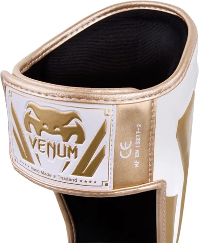 Vista 3 de Venum Espinilleras Elite Standup Blanco/Dorado