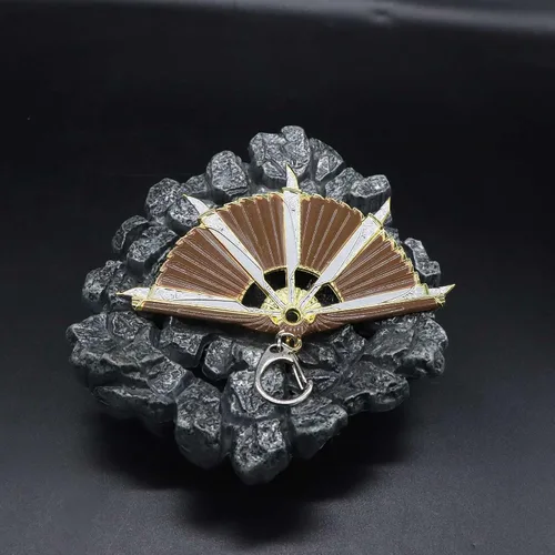 Vista 5 de crafthand Llavero de metal Loba Heirloom Mini Fan Metal Colgante Figura Decoración de Escritorio Mochila Colgante Suministros de Fiesta Regalo, Oro