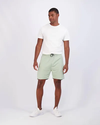 Vista 5 de Paquete de 4 pantalones cortos deportivos de malla de secado rápido para hombre de 7 pulgadas con bolsillos con cremallera y cordón