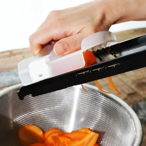 Vista 7 de KAKUSEE Mandolina de tres cuchillas, cortador de verduras con protector de dedos, corte de precisión sin esfuerzo y almacenamiento seguro, fabricado