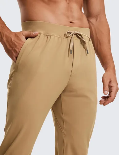 Vista 5 de CRZ YOGA Pantalones deportivos elásticos en 4 direcciones para hombre, de 30 pulgadas, para entrenamiento, casual, con bolsillo con cremallera
