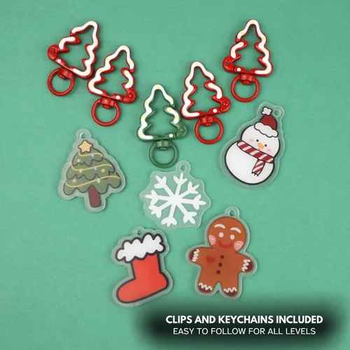 Vista 2 de Needzo Kit de ganchillo de llavero de Navidad, Amigurumi navideño, todos los suministros incluidos, tutoriales en video paso a paso, 5 diseños