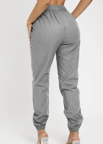 Vista 2 de Nihsatin Pantalones de lino para mujer, cintura elástica alta, con nudo frontal, pantalones cónicos con bolsillos