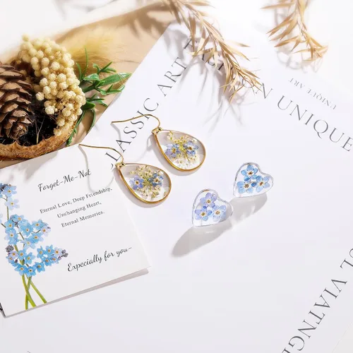 Vista 2 de AMEJEW Aretes de flores silvestres prensadas Forget-Me-Not Aretes colgantes para mujeres y niñas Pendientes de flores prensadas con lágrima