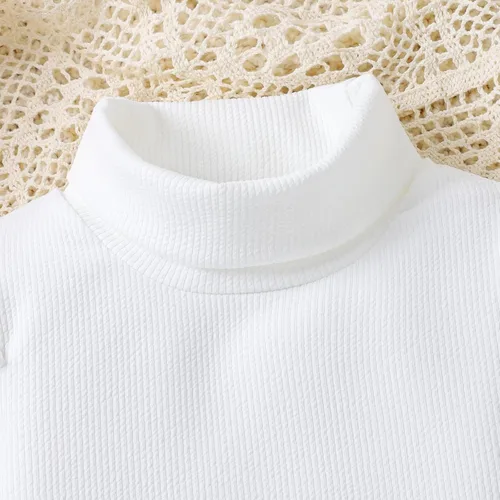 Vista 4 de 3 piezas de camisa de punto acanalado de manga larga con volantes y hombros para niñas pequeñas + falda acampanada a cuadros + boina