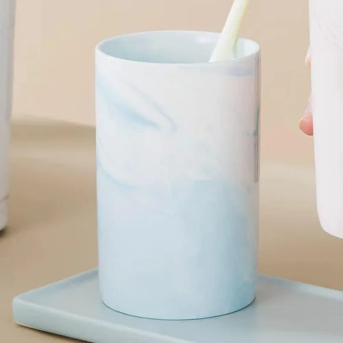 Vista 4 de Taza de cerámica de mármol, soporte para cepillos de dientes creativo, taza para beber simple (azul)