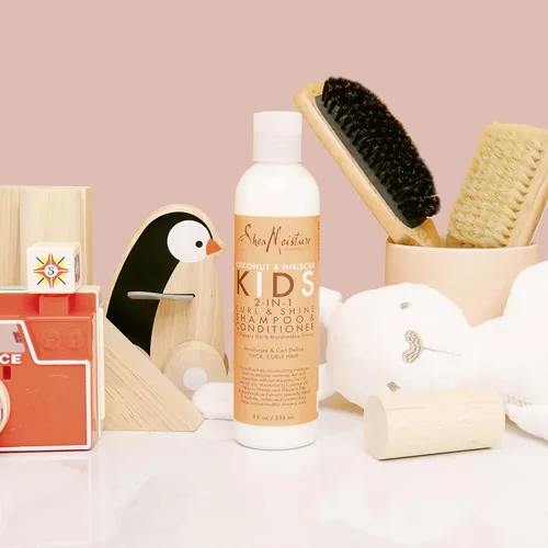 Vista 9 de Crema extra hidratante SheaMoisture Kids para quitar nudos Coco & Hibisco 8 oz Melocotón