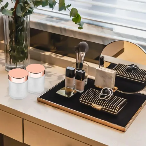 Vista 4 de Paquete de 4, tarros de vidrio esmerilado de 3.4 onzas con tapas, recipientes de almacenamiento vacíos redondos con tapas de oro rosa