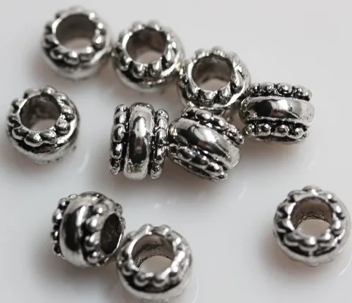 Vista 4 de Sexy Sparkles 10 cuentas espaciadoras europeas en tono plateado para pulseras de cadena de serpiente, aleación