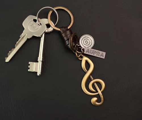 Vista 3 de AuPra Llavero de música, regalos para mujeres y hombres, llaveros de cuero para el hogar y la puerta del automóvil, soporte para llaves de niña