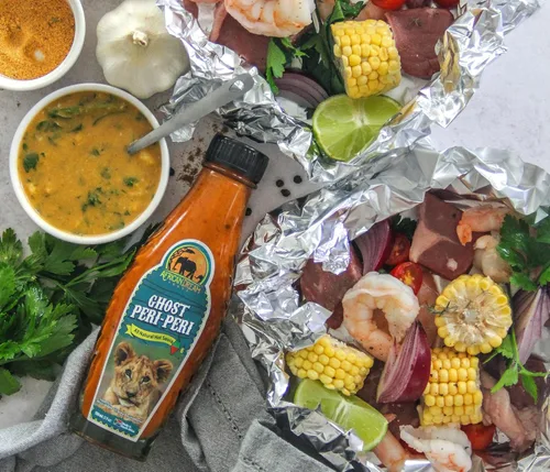 Vista 6 de Ghost Peri-Peri Salsa picante de African Dream Foods Salsa piri-piri picante totalmente natural con pimientos fantasma africanos Vegana, sin