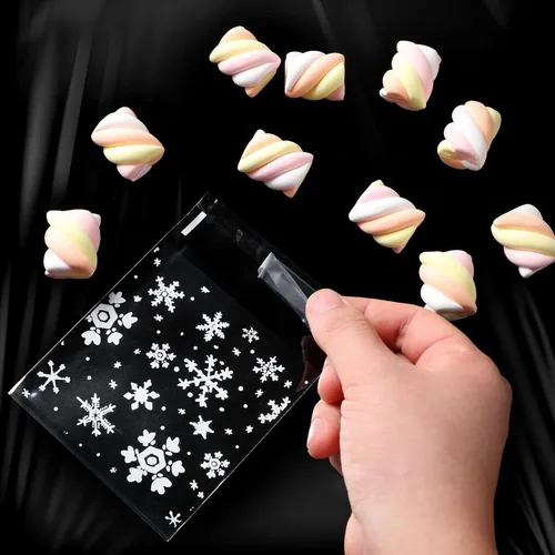 Vista 9 de Yinder 500 bolsas de invierno para galletas de invierno, bolsa de celofán con copos de nieve, bolsa de dulces autoadhesiva para suministros de Blanco