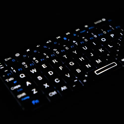 Vista 8 de Rii K06 Mini teclado Bluetooth, teclado inalámbrico retroiluminado de 2.4GHz con aprendizaje IR, portátil con panel táctil, compatible con Amazon