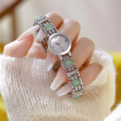 Vista 4 de Reloj de pulsera vintage para mujer, reloj de pulsera de cuarzo de acero inoxidable, resistente al agua