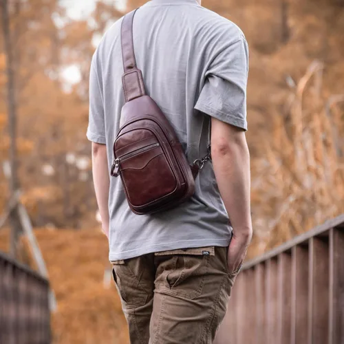 Vista 7 de Bolso bandolera de cuero genuino para hombres y mujeres, bolso de hombro cruzado, mochila de pecho, bolso de mano casual